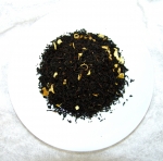 Tee Orange mit Schalen und Bl�ten - Schwarztee